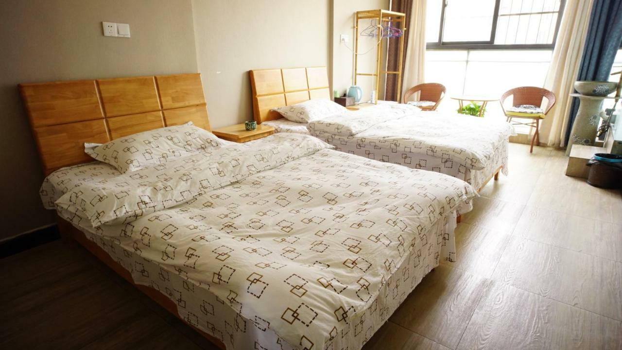Huanlesong Youth Hostel Wuhan Habitación foto